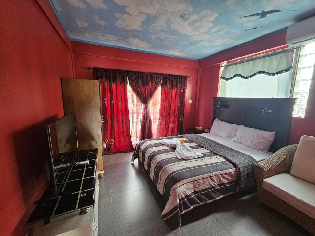 Postel nebo postele na pokoji v ubytování The Jungle Escape Apartment 02