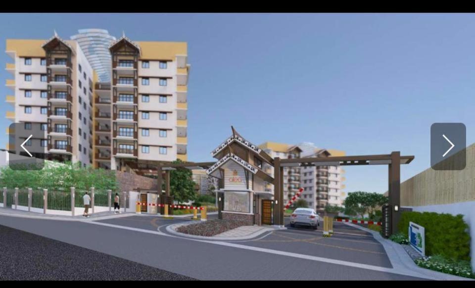 rendering of a city street with a building w obiekcie 2BR CONDO by DMCI near AIRPORT and MOA!!!FREE PARKING w mieście Manila