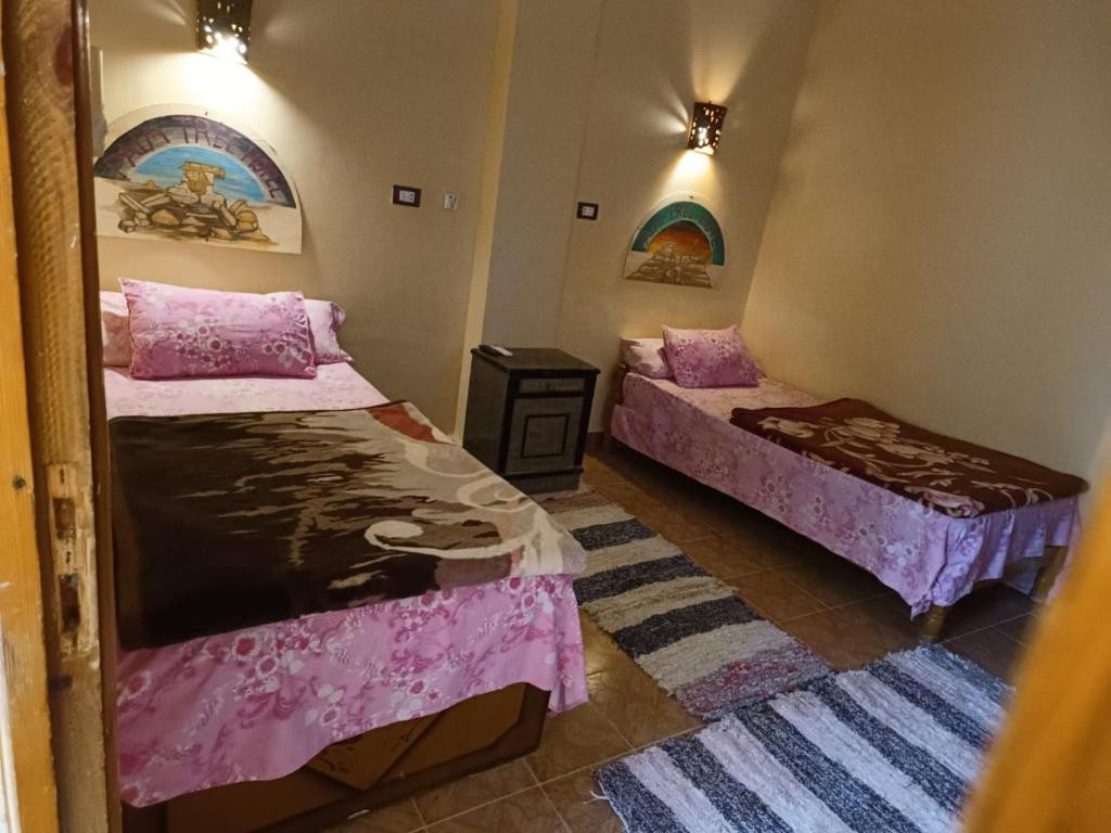 Postel nebo postele na pokoji v ubytování فندق النخيل