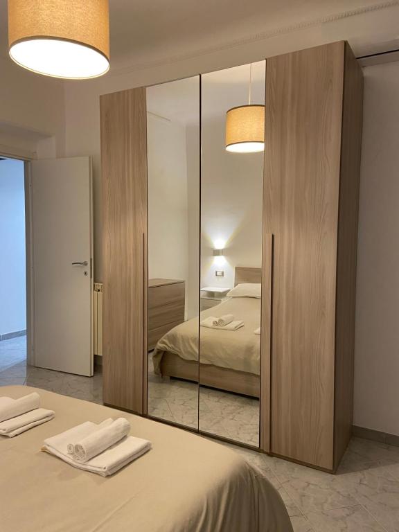 Postel nebo postele na pokoji v ubytování Paolina Home
