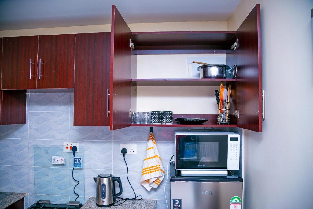 Kuchyň nebo kuchyňský kout v ubytování Sunset Bay Kisumu