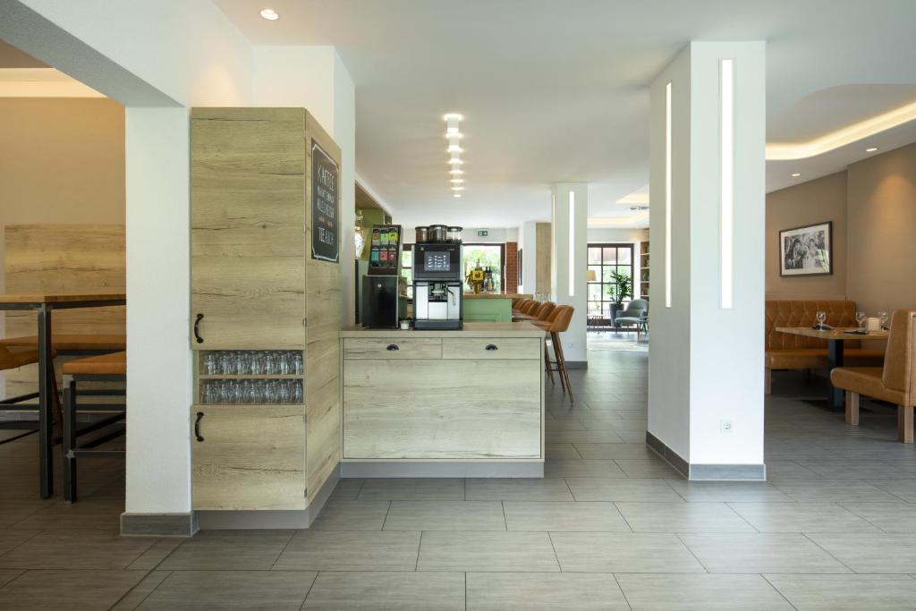 Posezení v ubytování zeitlos Hotel und Restaurant am Fuchsbach