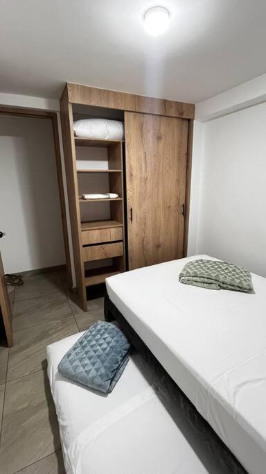 Postel nebo postele na pokoji v ubytování Mirador la casa del cóndor 3 habitaciones
