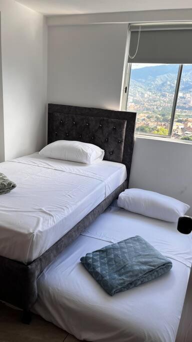 Postel nebo postele na pokoji v ubytování Mirador la casa del cóndor 3 habitaciones