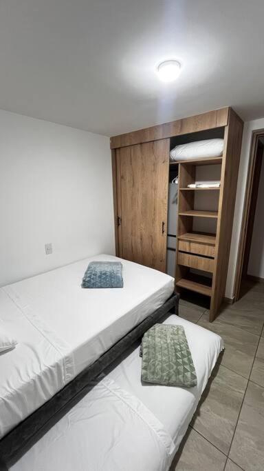 Postel nebo postele na pokoji v ubytování Mirador la casa del cóndor 3 habitaciones