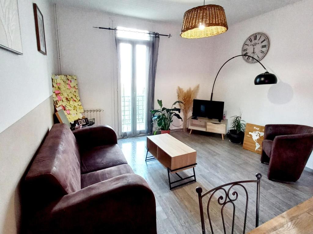 Posezení v ubytování Logement Cosy 58m2 centre ville