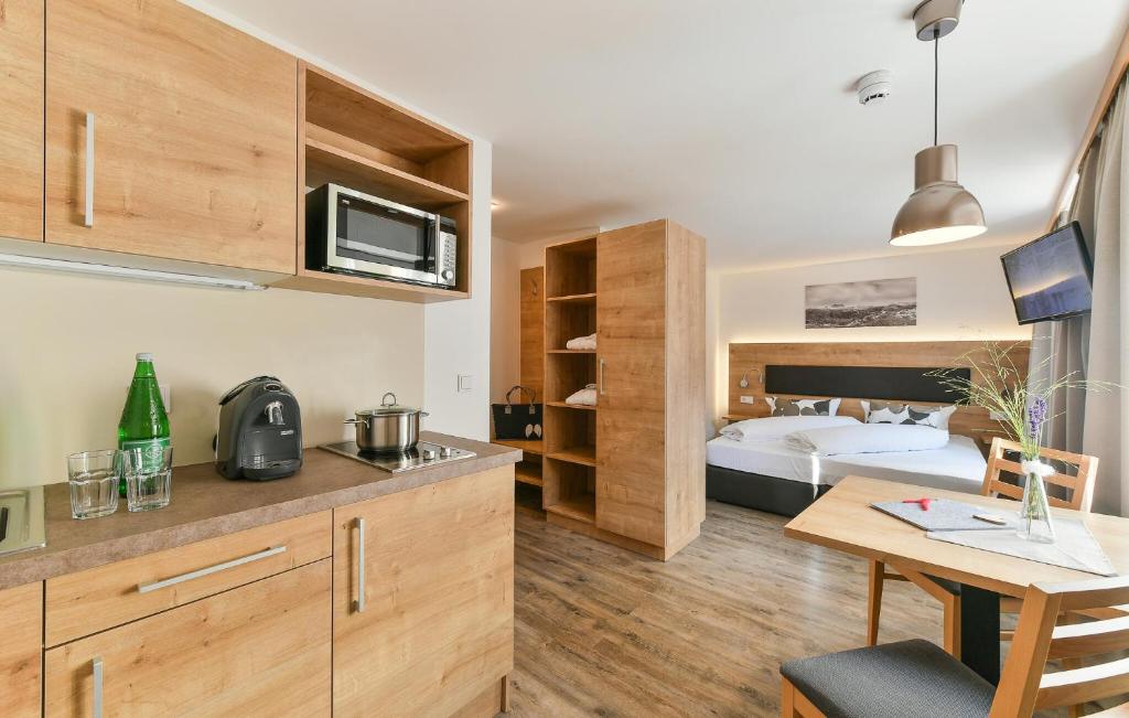 Kuchyň nebo kuchyňský kout v ubytování Moderne Ferienw, Kloesterle