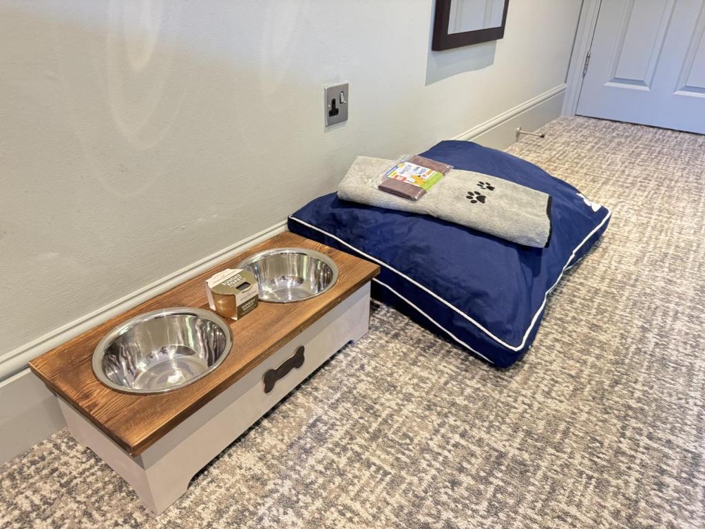 Un ou plusieurs lits dans un hébergement de l'établissement Mandolay Hotel Guildford