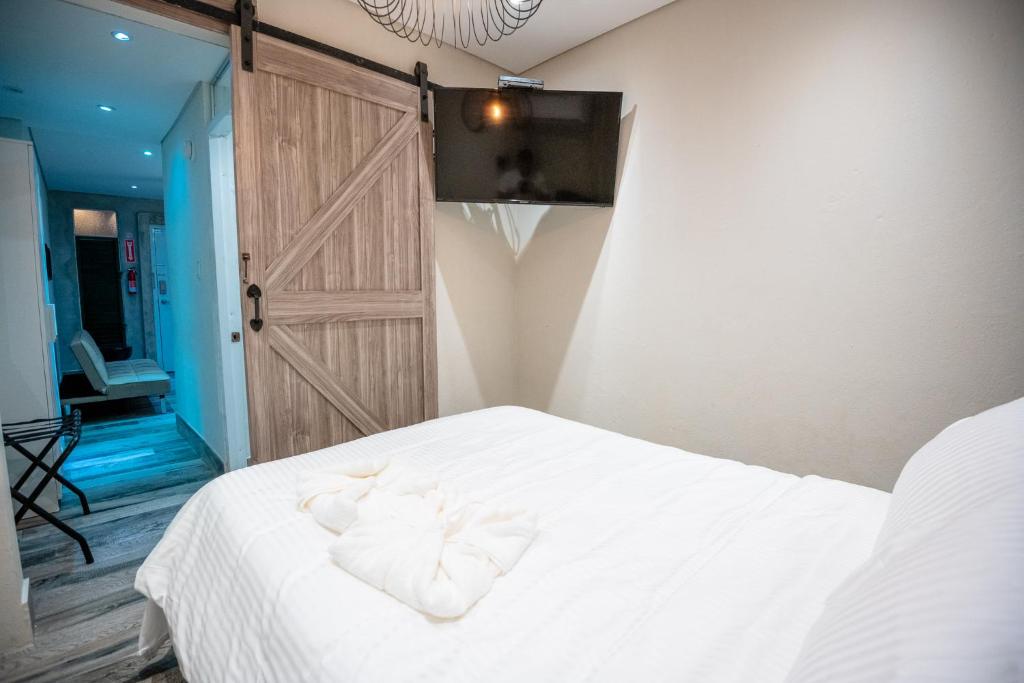 Postel nebo postele na pokoji v ubytování Tapia Haus 103