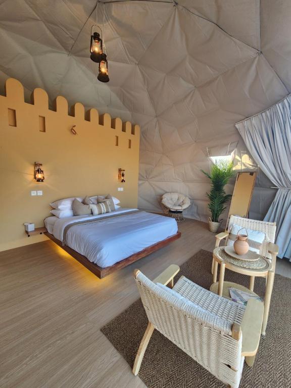 Voodi või voodid majutusasutuse Bubbles Domes Private Cmp toas