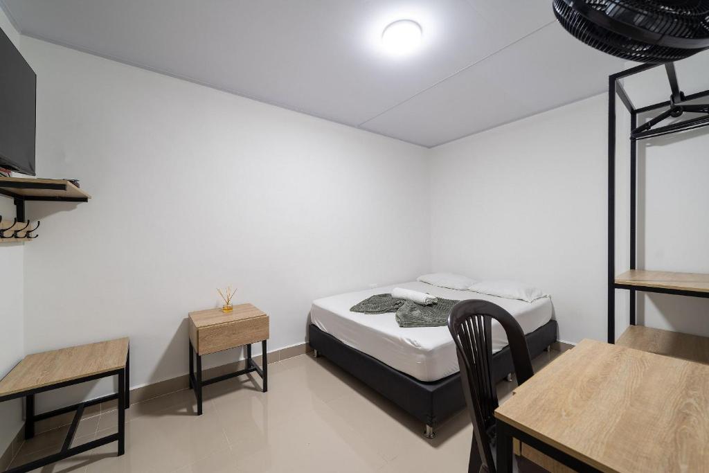 Postel nebo postele na pokoji v ubytování Hotel Doxa