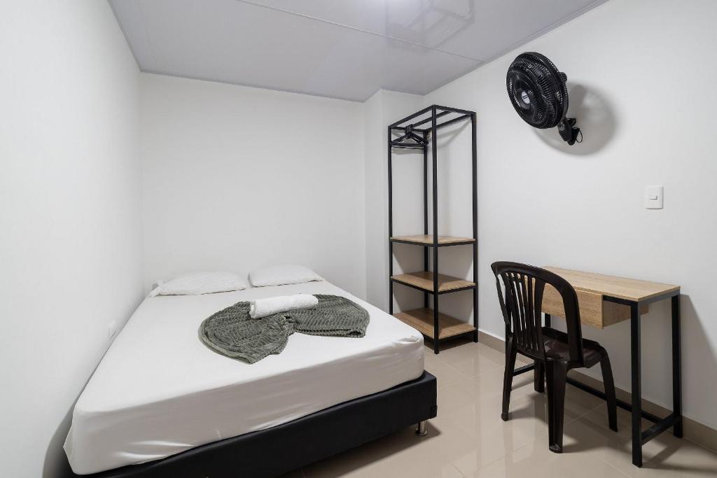 Postel nebo postele na pokoji v ubytování Hotel Doxa