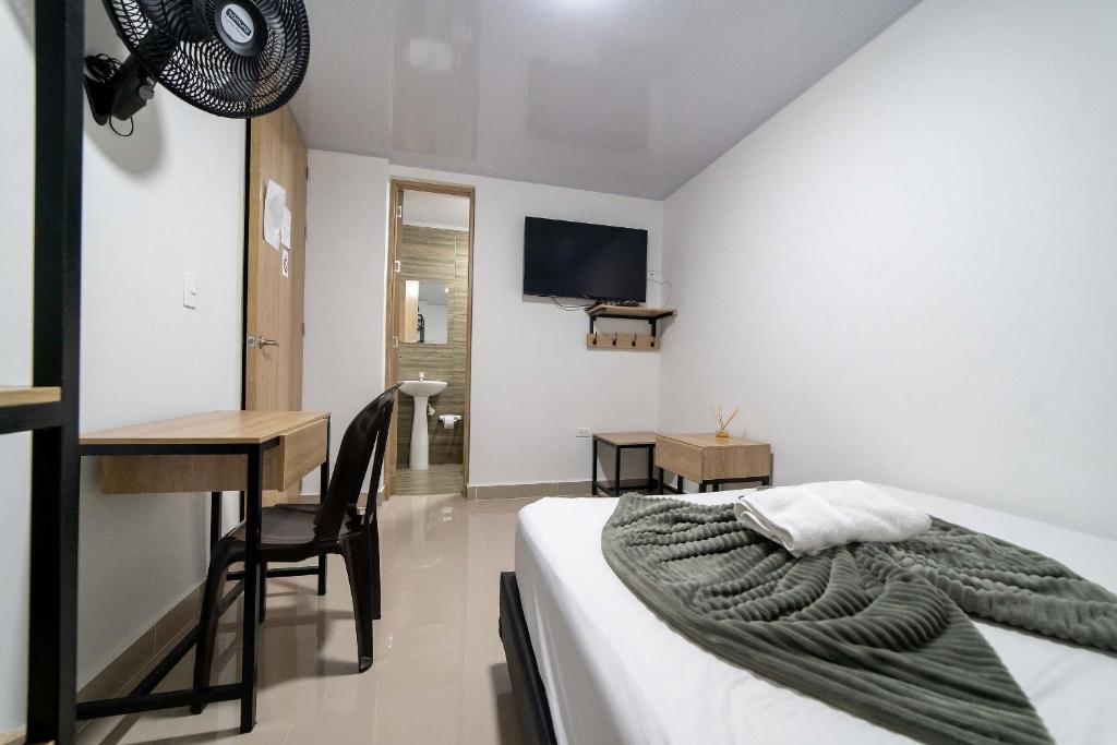 TV a/nebo společenská místnost v ubytování Hotel Doxa