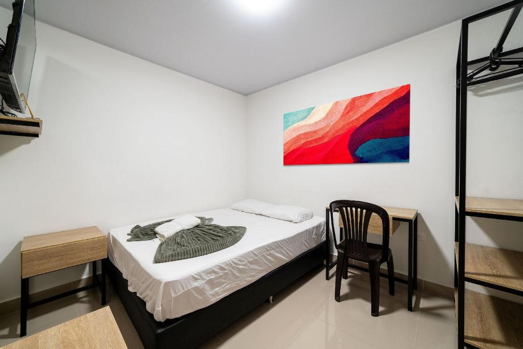 Postel nebo postele na pokoji v ubytování Hotel Doxa