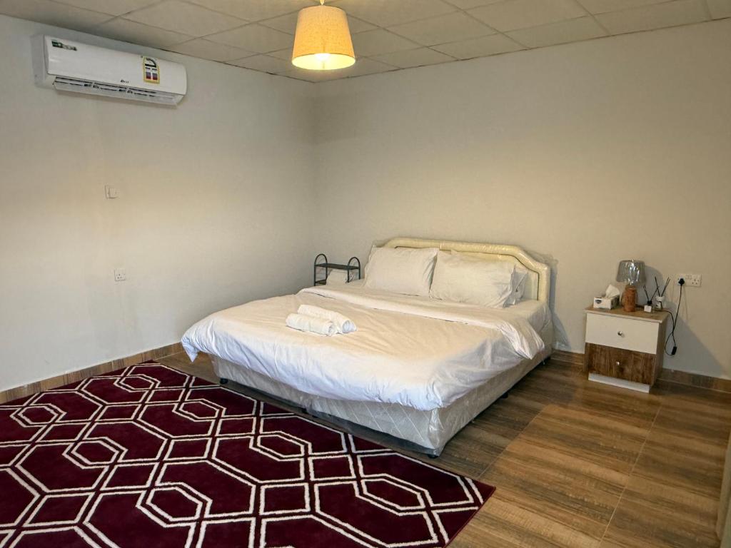 Una cama o camas en una habitación de Sand Camp