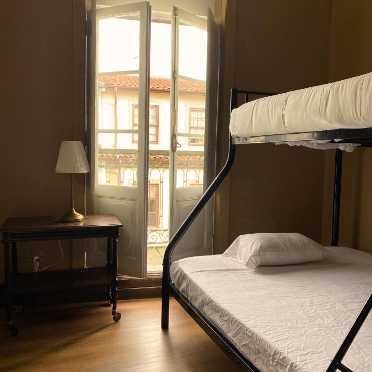 Postel nebo postele na pokoji v ubytování Casa Quixote