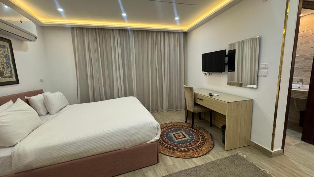 TV a/nebo společenská místnost v ubytování Pyramids Hotel