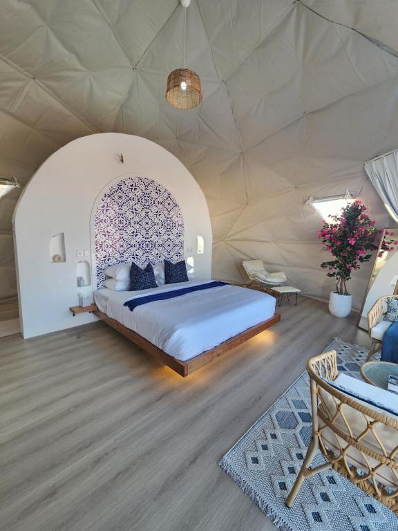 Voodi või voodid majutusasutuse Bubbles Domes Private Cmp toas