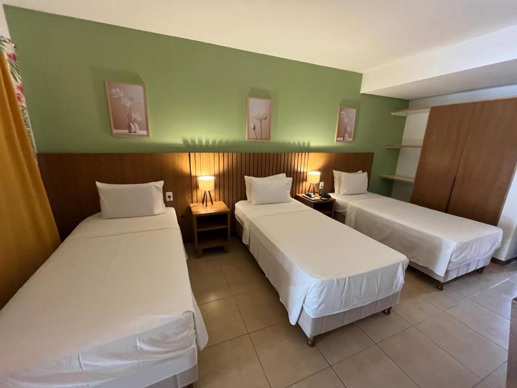 Postel nebo postele na pokoji v ubytování Mar Paraíso Hotel