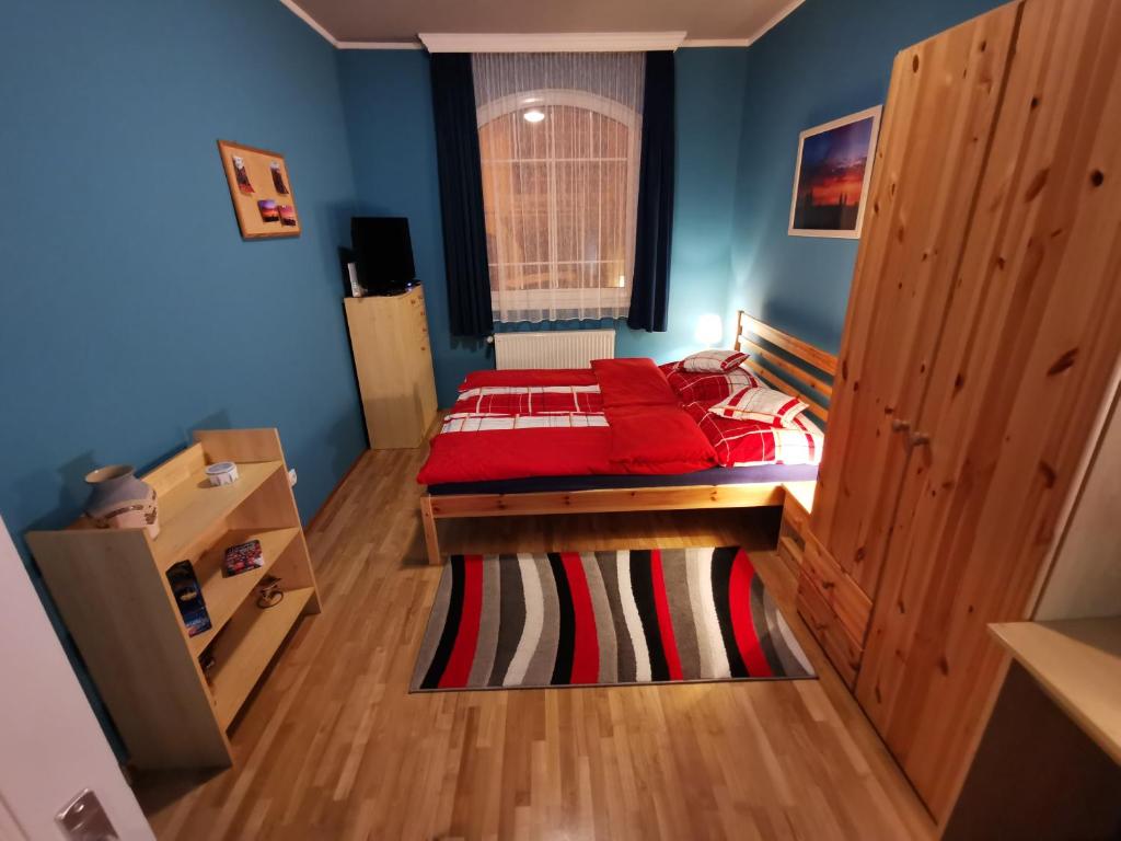 Postel nebo postele na pokoji v ubytování Boros Vendégház Eger