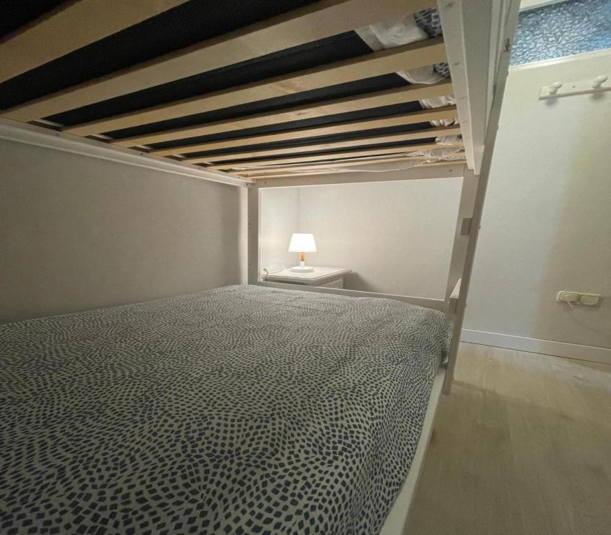 Posteľ alebo postele v izbe v ubytovaní Apartamento Ameto en la plaza Pradollano"Junto al telecabina Borreguiles"