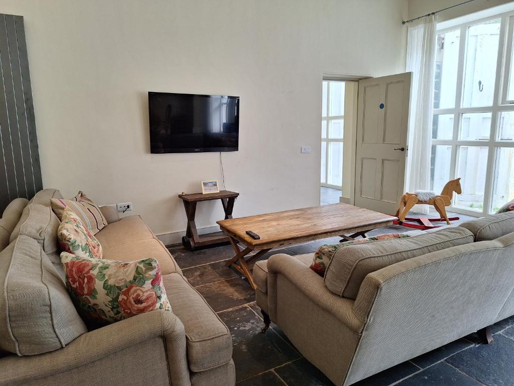 TV&#47;Unterhaltungsangebot in der Unterkunft Plas Nanteos Mansion