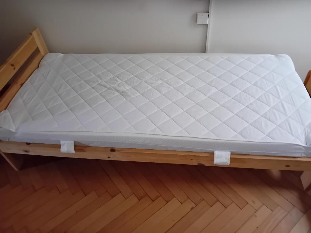 Postel nebo postele na pokoji v ubytování Holub apartment in city centrum
