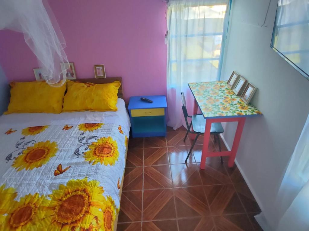 Postel nebo postele na pokoji v ubytování ALME cabañas Olmué