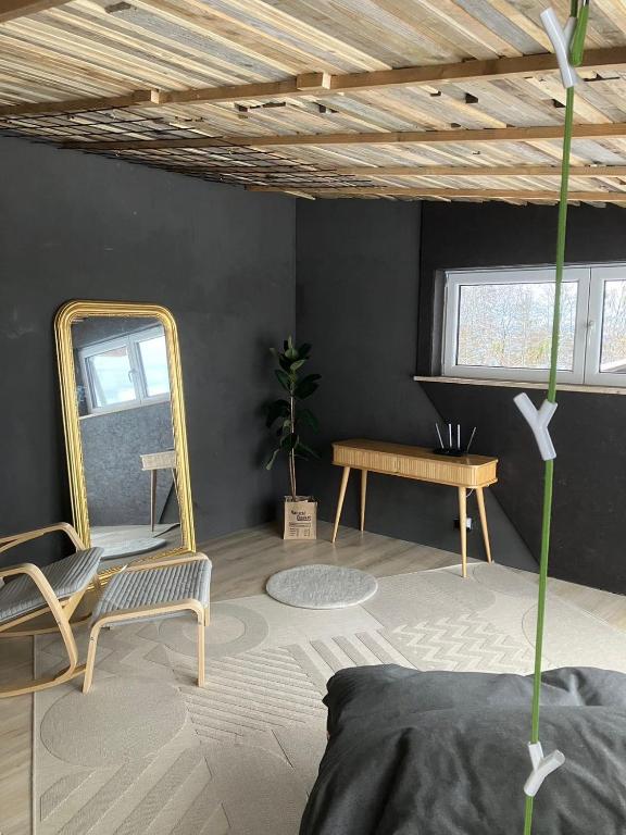 Posezení v ubytování Grand appart familial Nature et Sauna - Le Terrier Ovifat