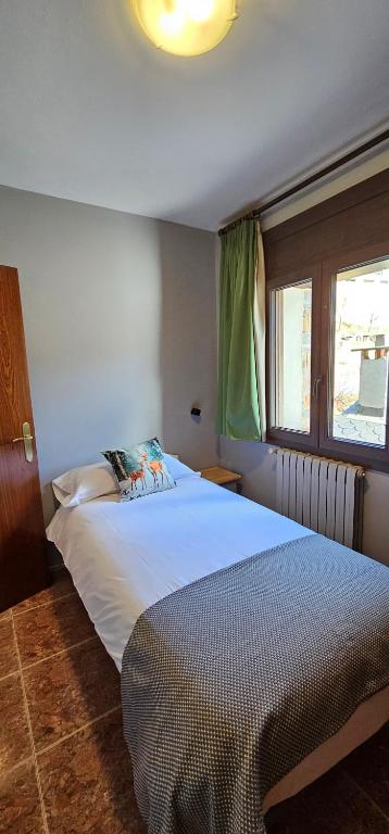 Postel nebo postele na pokoji v ubytování Apartaments Bonet