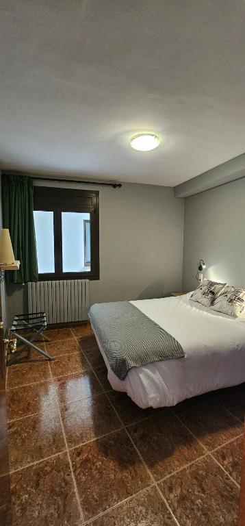 Postel nebo postele na pokoji v ubytování Apartaments Bonet
