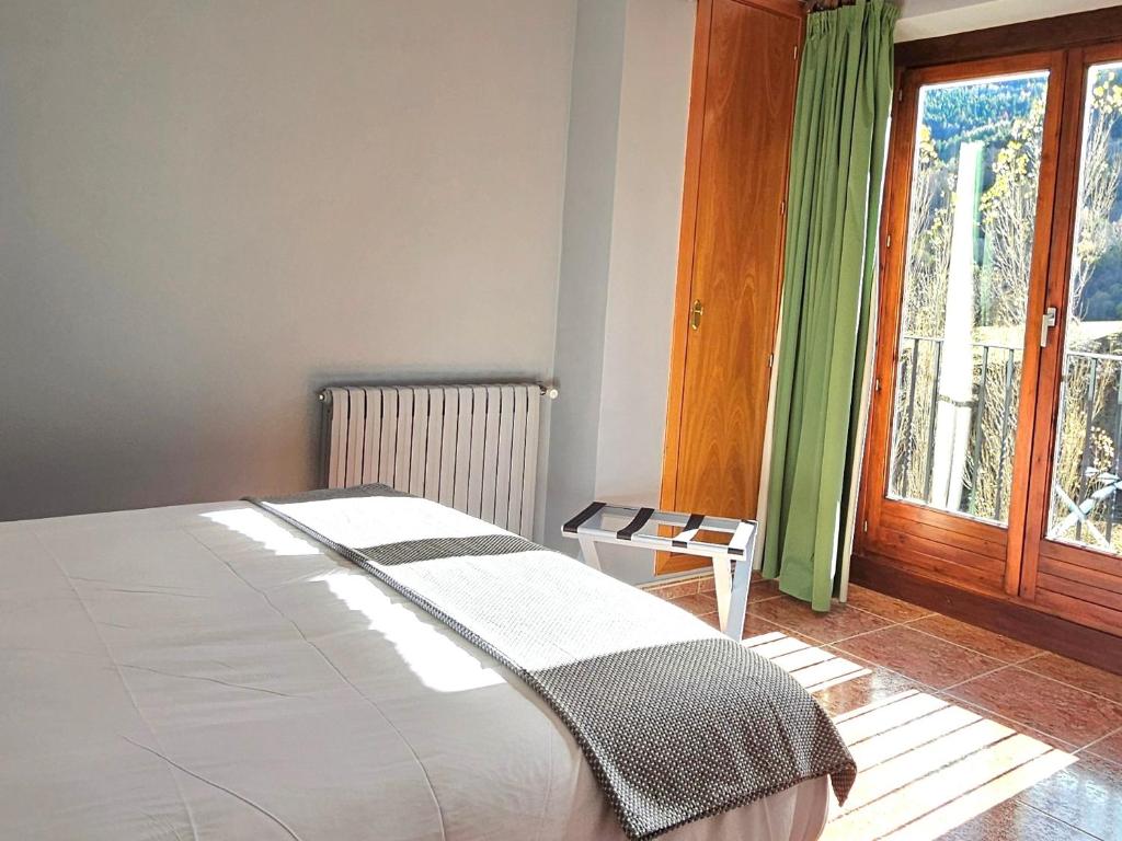Postel nebo postele na pokoji v ubytování Apartaments Bonet
