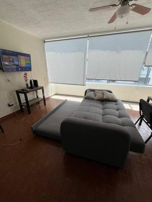 Postel nebo postele na pokoji v ubytování Morelos 67 Apartment