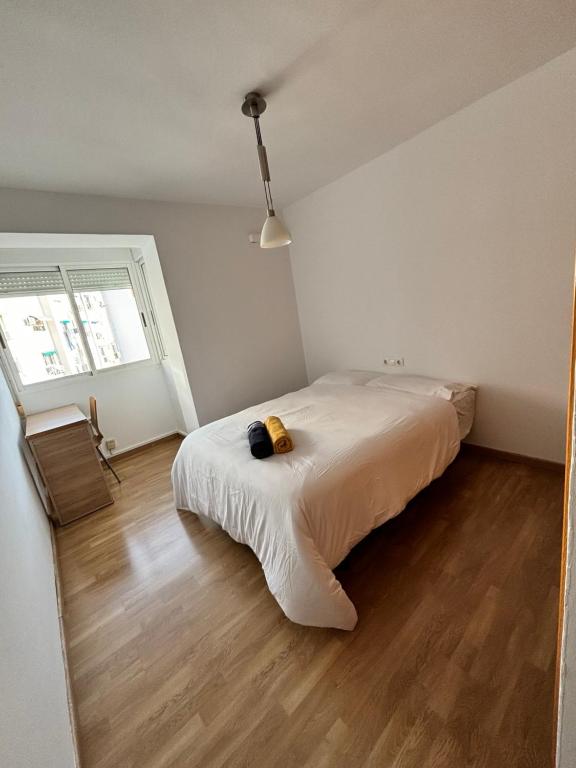 En eller flere senge i et værelse på Cute and Cosy Room