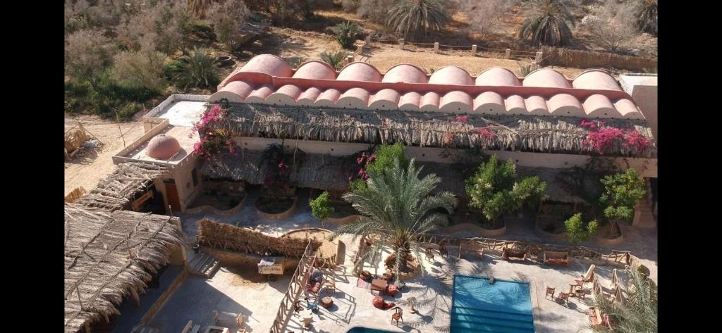 Bazén v ubytování Aghurmi Siwa Ecolodge & Salt Cave nebo v jeho okolí