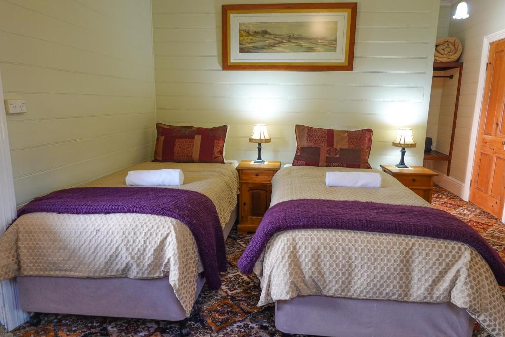 Postel nebo postele na pokoji v ubytování Waterfront Casilda Guesthouse