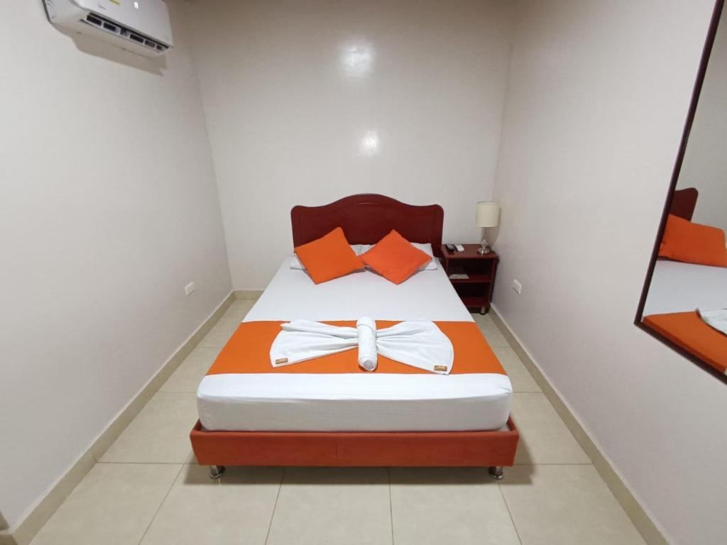 Postel nebo postele na pokoji v ubytování Hotel Colonial Villavieja