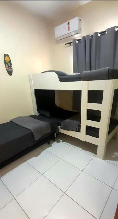 Postel nebo postele na pokoji v ubytování Dunas residence casa 04