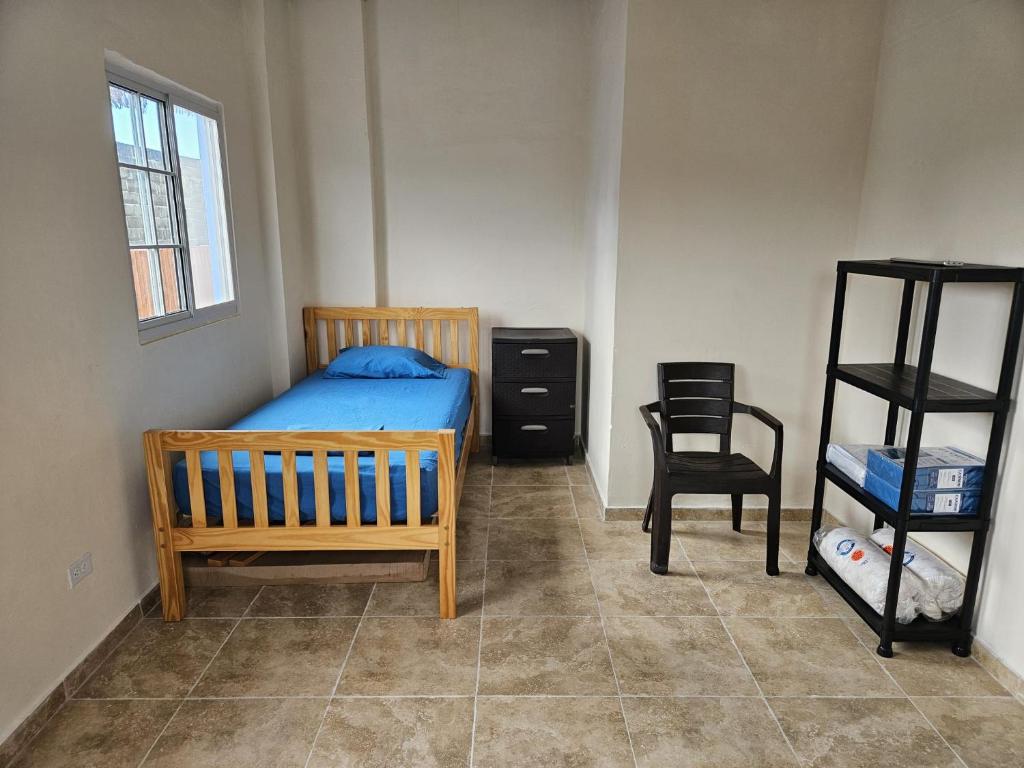 Postel nebo postele na pokoji v ubytování Casa Azul Miguel de la Borda
