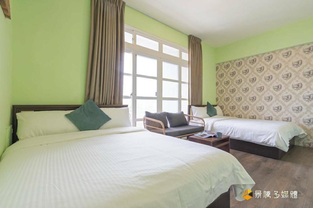 Postel nebo postele na pokoji v ubytování Janice's Inn