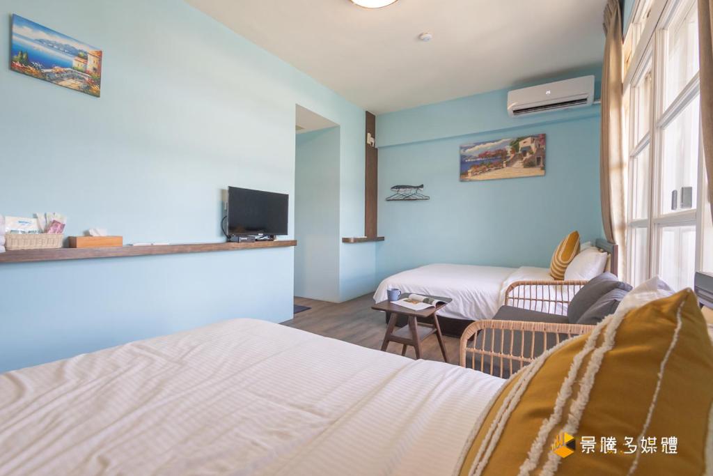 Postel nebo postele na pokoji v ubytování Janice's Inn