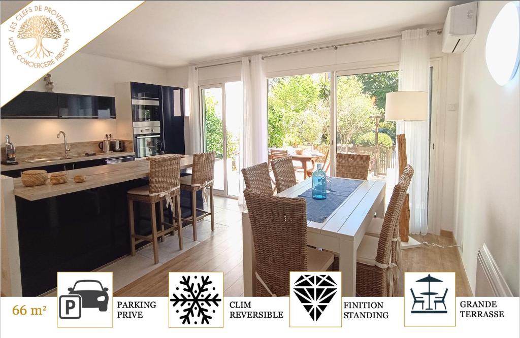 une cuisine et une salle à manger avec une table et des chaises dans l'établissement Le Ptit Paradis d'Emma - Grand T3, Parking, Terrasse, à Cassis