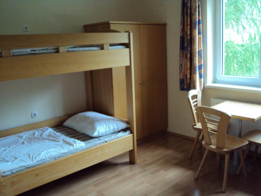 Postel nebo postele na pokoji v ubytování Jutel Hinterstoder