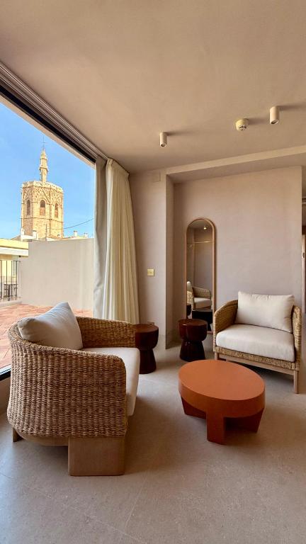 Posezení v ubytování Cosy Rooms Tapinería