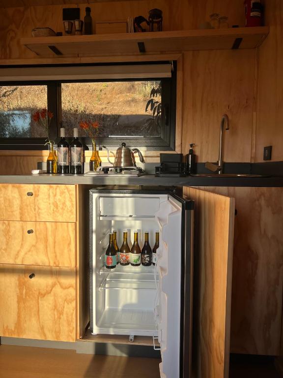 Kuchyň nebo kuchyňský kout v ubytování Cabaña en Santuario El Ajial - Paine - Tucu Cabins