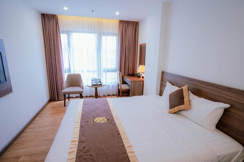 Postel nebo postele na pokoji v ubytování Hotel A89 Rosarian