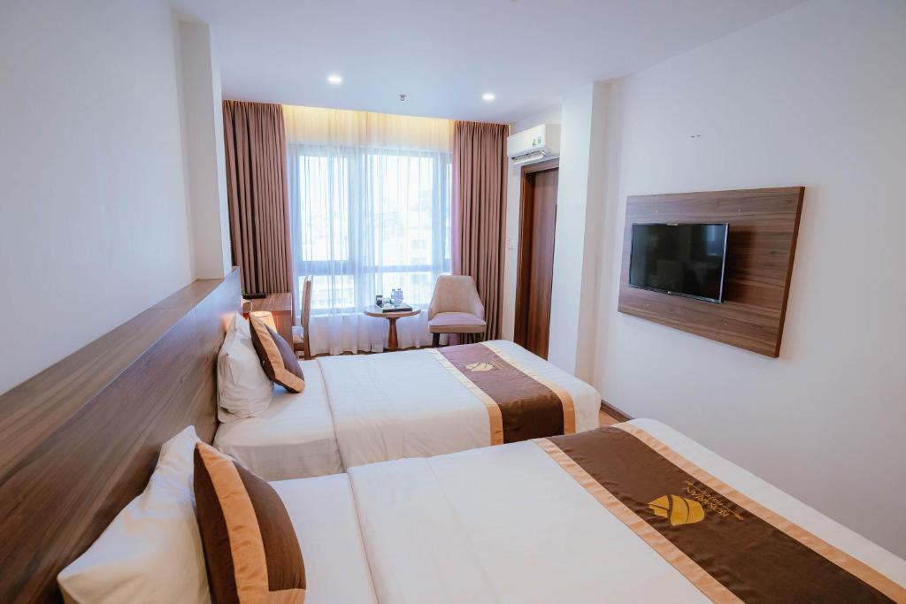 TV a/nebo společenská místnost v ubytování Hotel A89 Rosarian