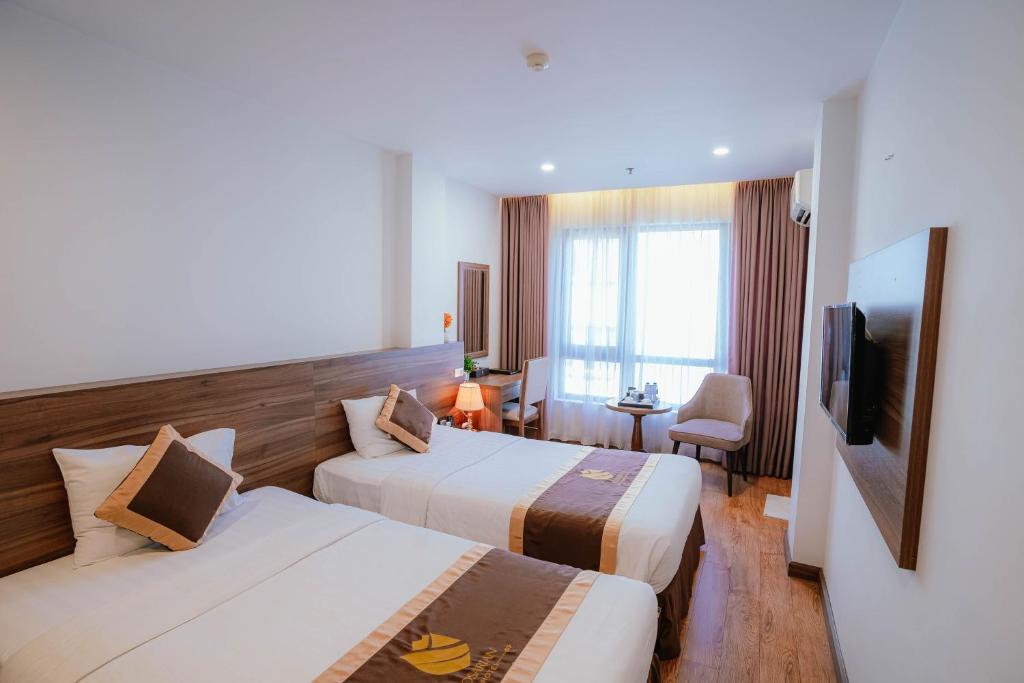 TV a/nebo společenská místnost v ubytování Hotel A89 Rosarian