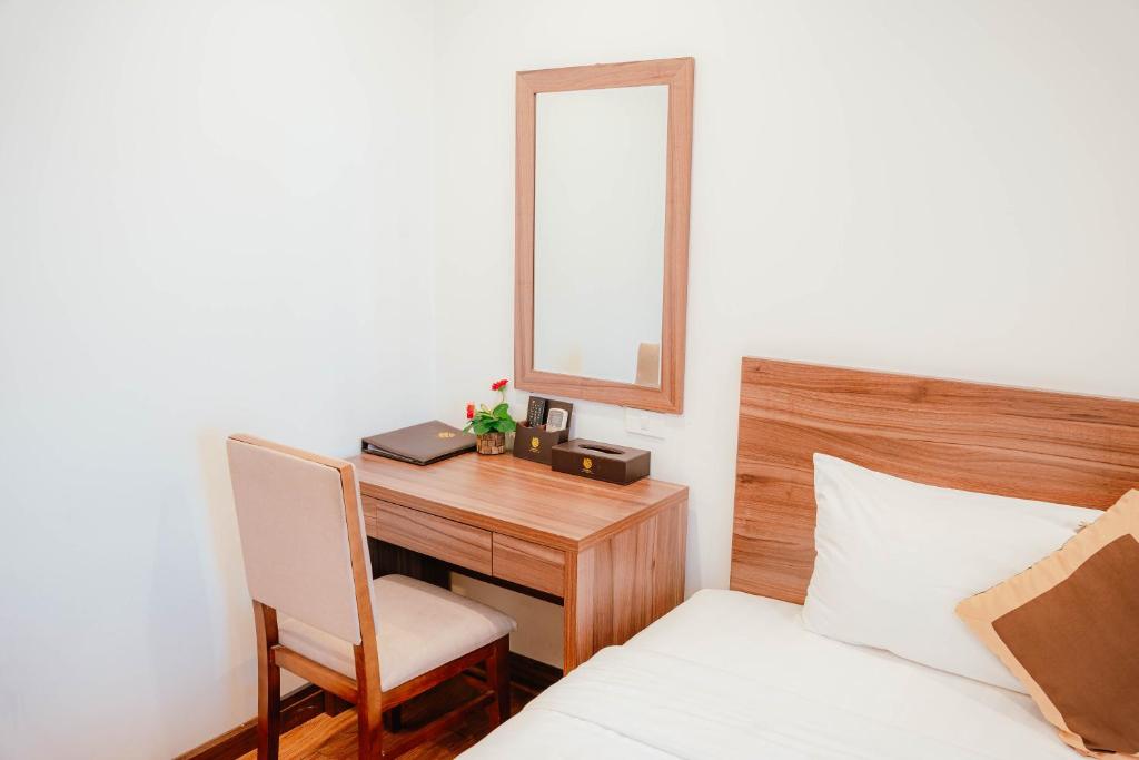 Postel nebo postele na pokoji v ubytování Hotel A89 Rosarian