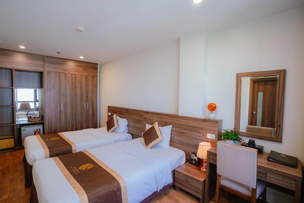 Postel nebo postele na pokoji v ubytování Hotel A89 Rosarian